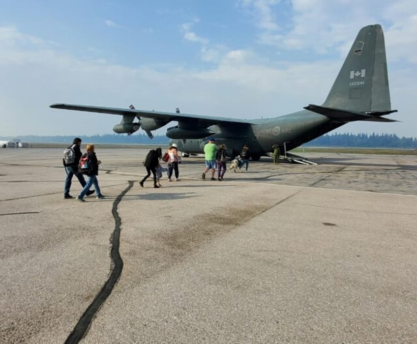 canada far north city ordered to evacuate as wildfires advance