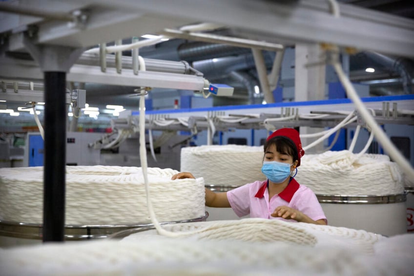 canada probes slavery allegations in walmart and hugo boss supply chains
