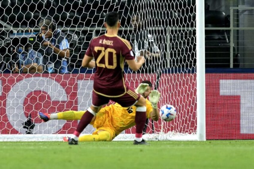 Venezuela's Wilker Angel sees his penalty saved by Canada's Maxime Crepeau in the Copa Ame