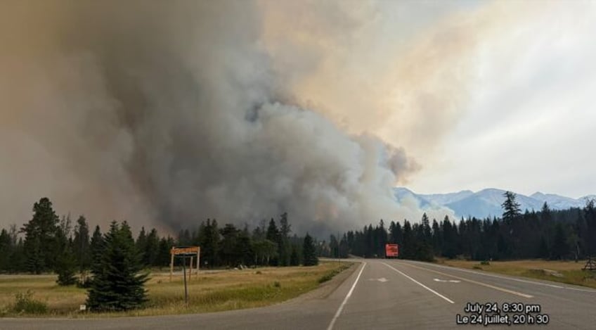 Smoke from a wildfire rises over Jasper National Park in Canada on July 24, 2024