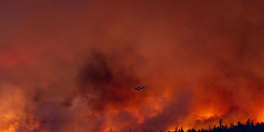 canadas british columbia declares state of emergency as thousands are forced to evacuate kelowna