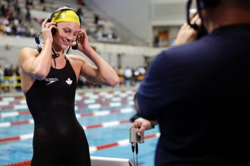 Canadian Summer McIntosh gives an interview after winning the women's 200m freestyle at the Pro Swim series meeting in Knoxville, Tennessee