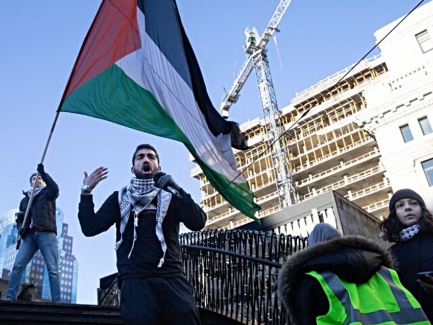 Demonstrators in support of Palestinians hold a rally to call for a ceasefire, at Dorchester Square in Montreal, Quebec, Canada, on November 18, 2023. Israel has vowed to destroy Hamas in response to the October 7 attacks which Israeli officials say killed about 1,200 people, most of them civilians in …