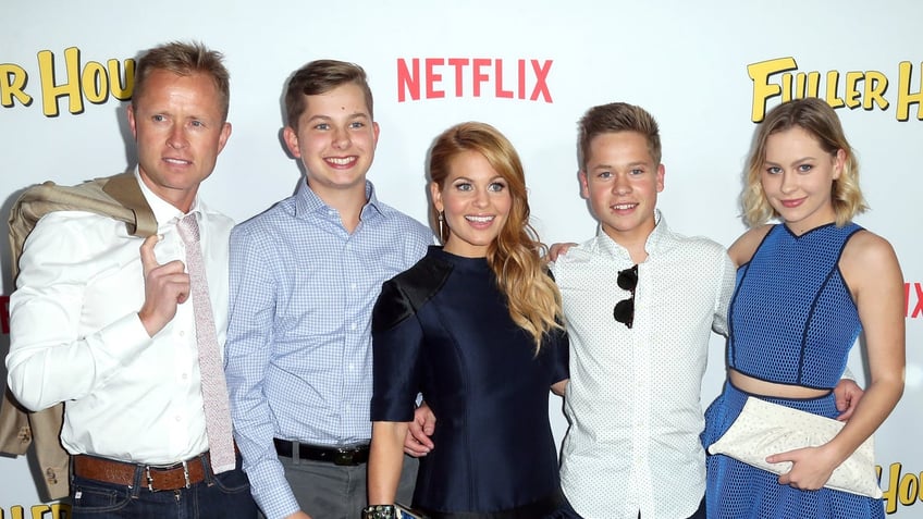 aleri Bure, Lev Valerievich Bure, actress Candace Cameron-Bure, Maksim Valerievich Bure, and Natasha Valerievna Bure attend the premiere of Netflix's "Fuller House"