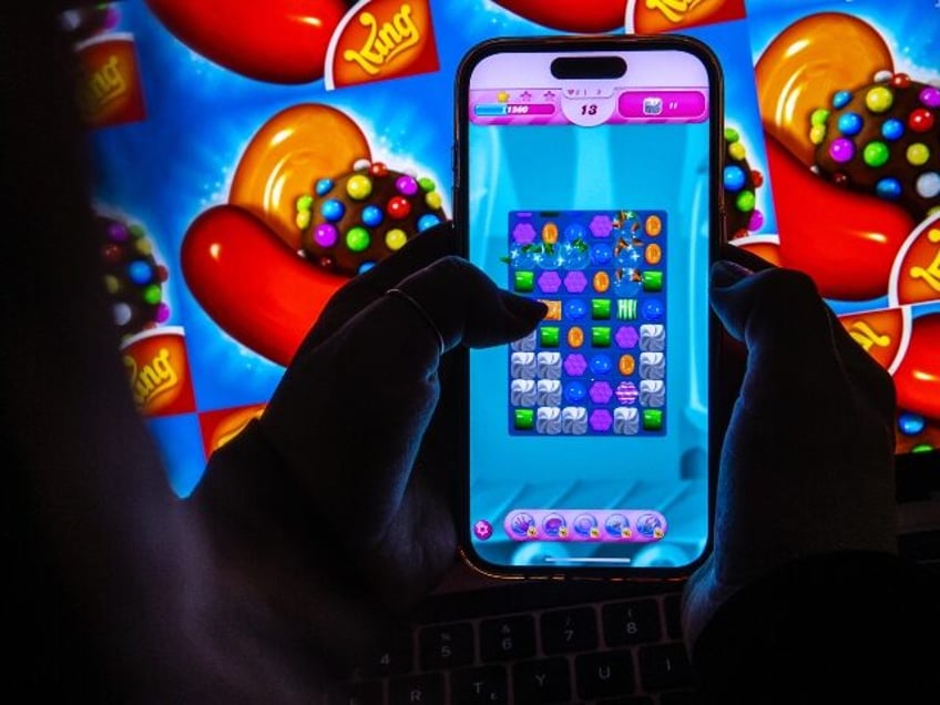 a person playing Candy Crush