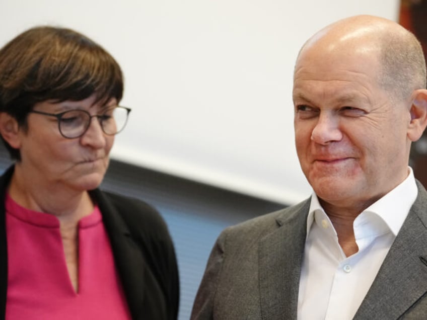 07 November 2023, Berlin: Federal Chancellor Olaf Scholz (SPD) and Saskia Esken, Federal Chair of the SPD, take part in their party's parliamentary group meeting. Photo: Kay Nietfeld/dpa (Photo by Kay Nietfeld/picture alliance via Getty Images)