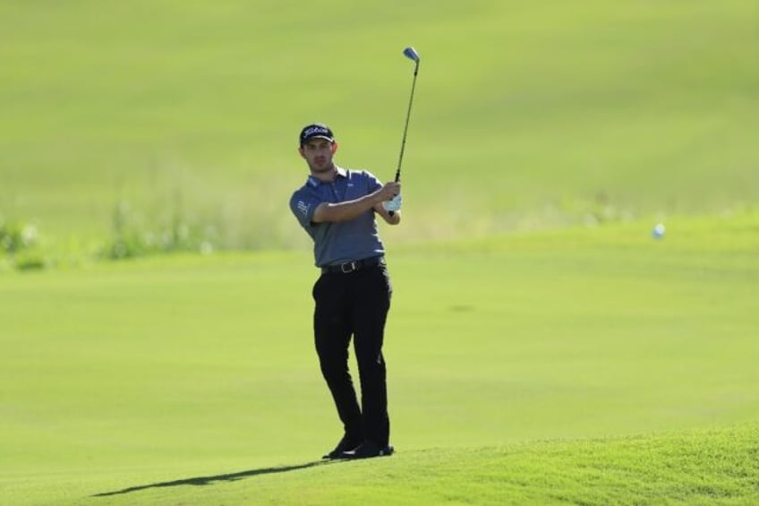 Fifth-ranked Patrick Cantlay of the United States, a member of the PGA Tour Policy Board in talks on a merger with Saudi backers of LIV Golf, practices ahead of the PGA Tour's 2024 season opener in Hawaii