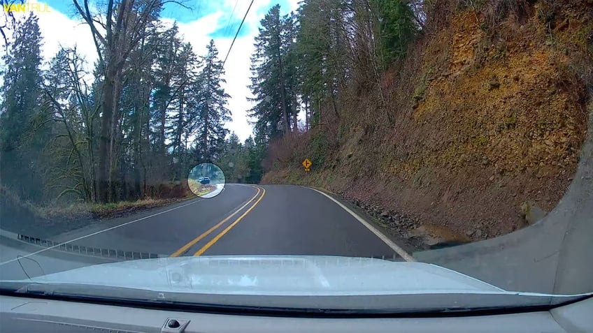 Car in dirt on Oregon road