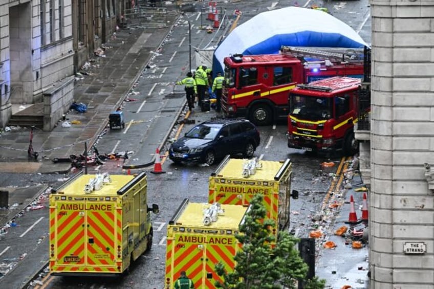 Emergency services in Liverpool's Water Street after a car rammed through football fans ce