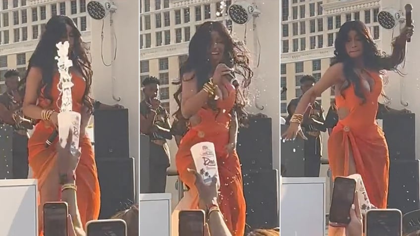 cardi b hurls microphone at fan during vegas concert after being splashed by drink