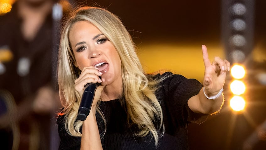 carrie underwood warns of kids watching too much tv notices attitude change in sons