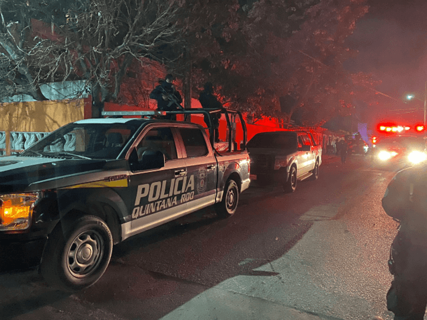 Quintana Roo Police look over a crime scene near Cancun. (Credit: Quintana Roo State Polic