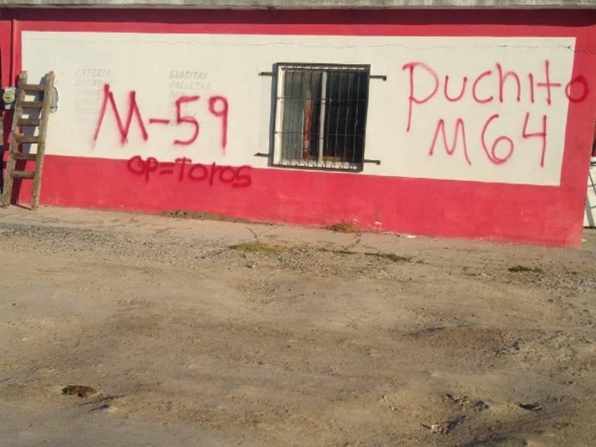 cartel gunmen shoot up graffiti mexican border city amid turf war