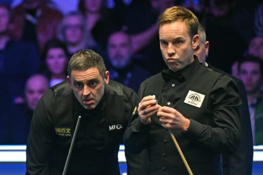 England's Ronnie O'Sullivan (left) and Ali Carter (right) have exchanged barbs after clashing in Sunday's Masters final