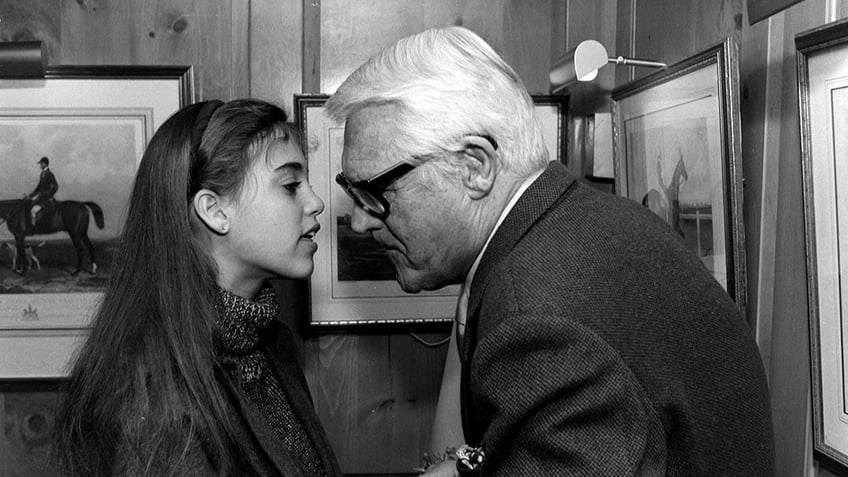 Jennifer Grant talking with her father Cary Grant
