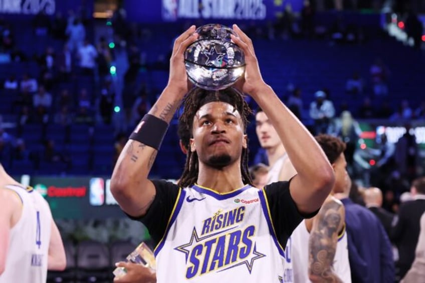 San Antonio Spurs forward Stephon Castle celebrates after leading Team C to the NBA Rising