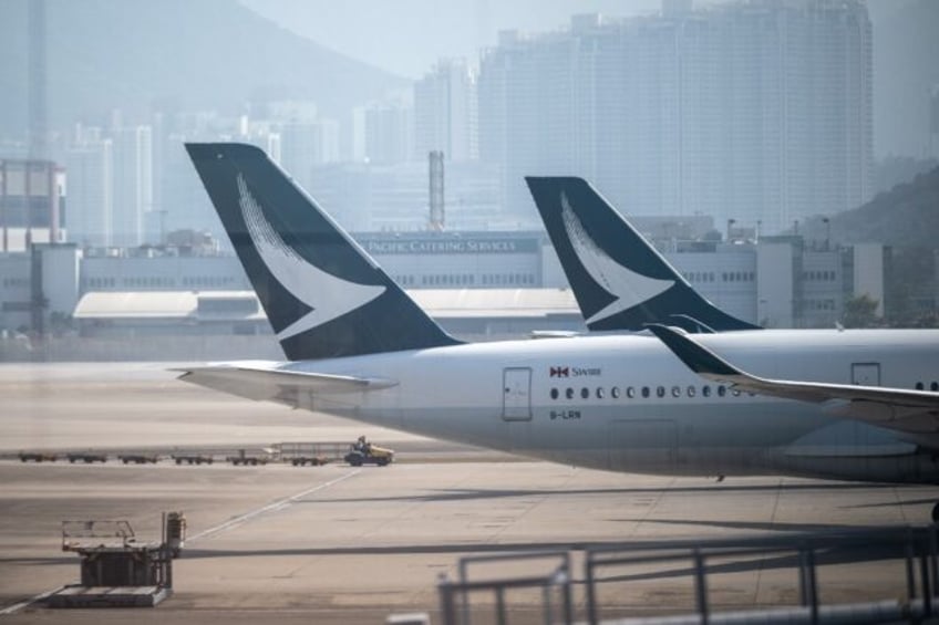 cathay pacific rebounds to first half profit as travel picks up