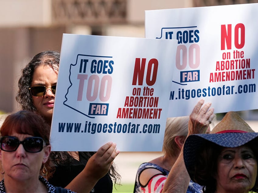 FILE - Anti-abortion protesters gather for a news conference after Arizona abortion-rights