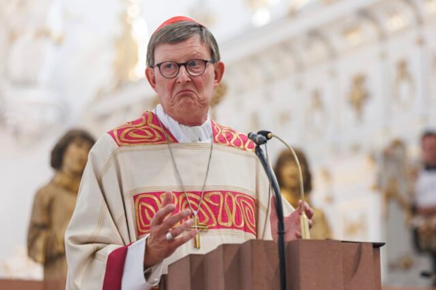 catholic priests have held a ceremony blessing same sex couples in defiance of a german archbishop