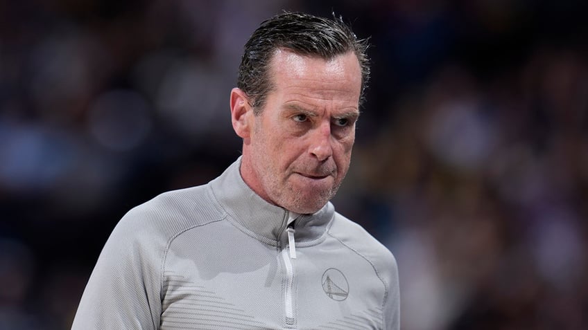 Kenny Atkinson walks the sidelines