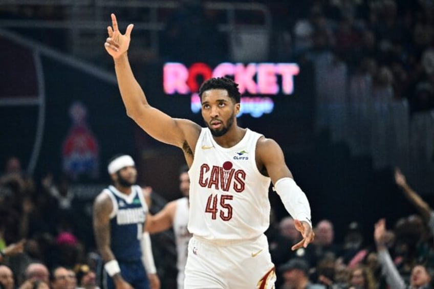 Cleveland's Donovan Mitchell celebrates during the first quarter of the Cavaliers' blowout