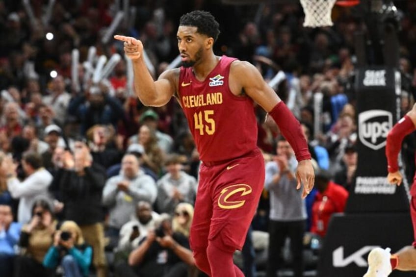 Cleveland's Donovan Mitchell celebrates a Cavaliers basket during in the fourth quarter of