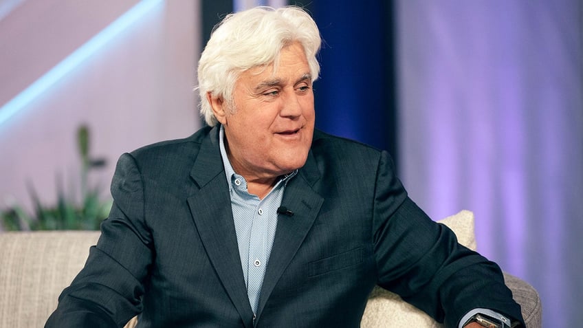 Jay Leno on "The Kelly Clarkson Show" in a blazer speaking on stage