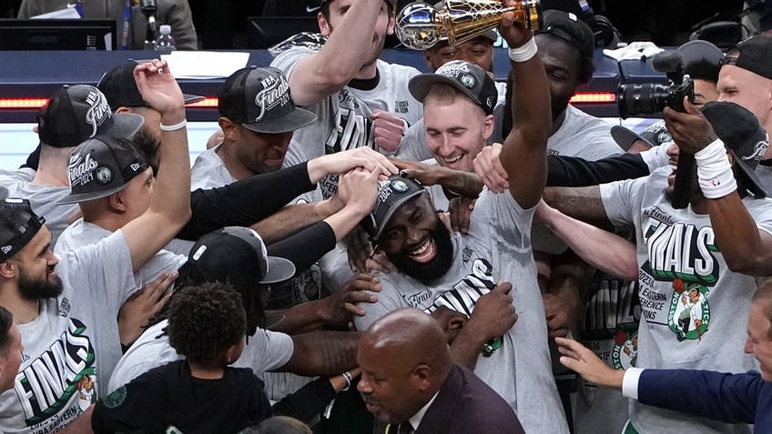 Jaylen Brown with trophy