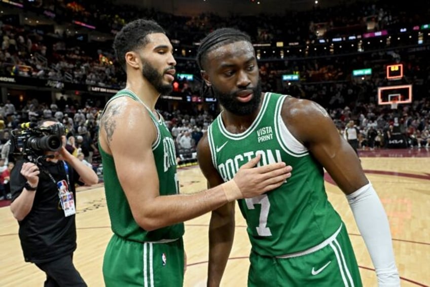 Boston's Jayson Tatum and Jaylen Brown celebrate the Celtics' victory over the Cleveland C