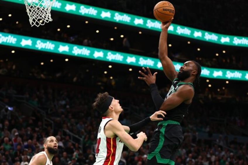 Boston's Jaylen Brown soars over Miami's Tyler Herro as the Celtics completed a 4-1 playof
