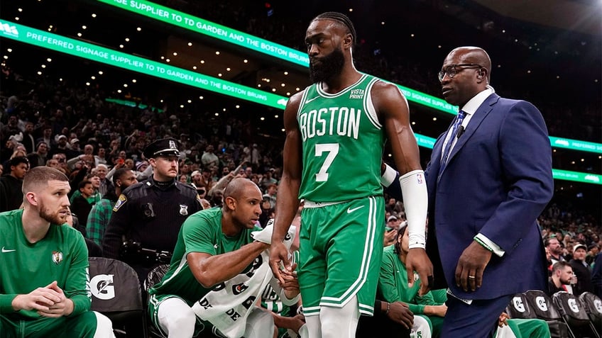 Jaylen Brown walks off the court