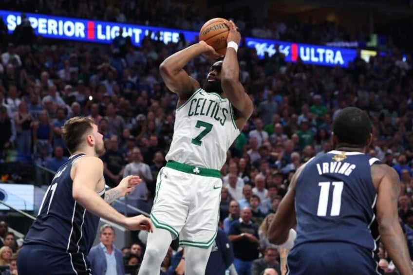 Boston's Jaylen Brown shoots over Luka Doncic in the Celtics' game-three victory over Dall