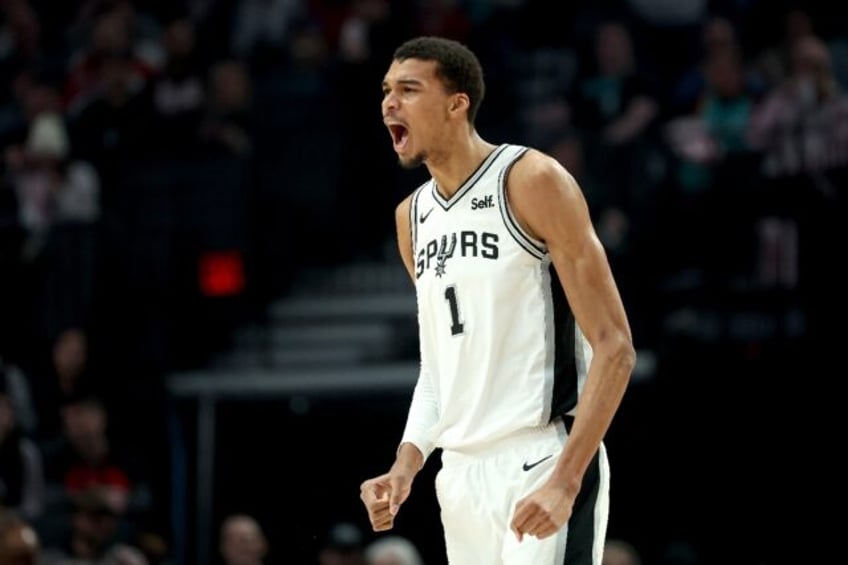 San Antonio star rookie Victor Wembanyama reacts in the first quarter of the Spurs' NBA victory over the Portland Trail Blazers