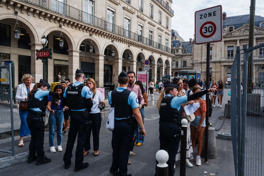 central paris enters lock down for olympics as athletes fans arrive