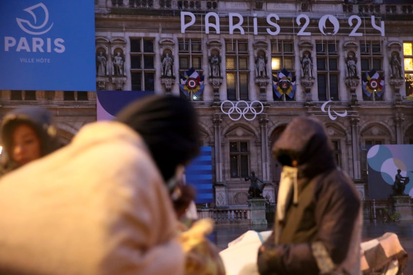 central paris migrant camp cleared out ahead of olympic games