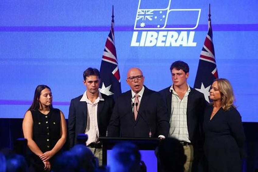 centre left labor party wins australian election opposition leader loses his seat