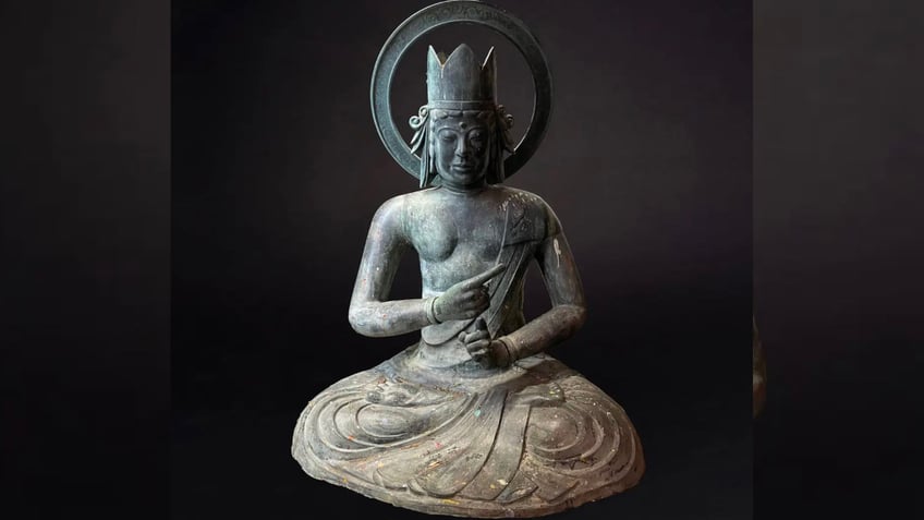 centuries old buddha statue snatched from los angeles art gallery in dark of night authorities nab suspect