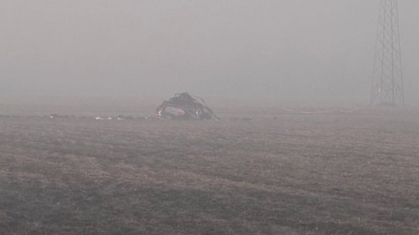 Foggy helicopter crash scene