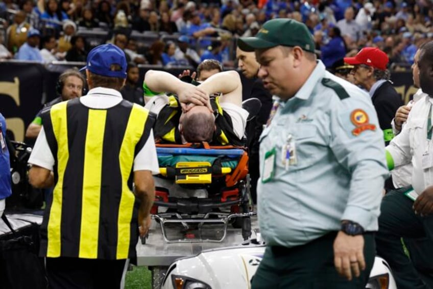 chain crew member dislocated his knee during lions saints game