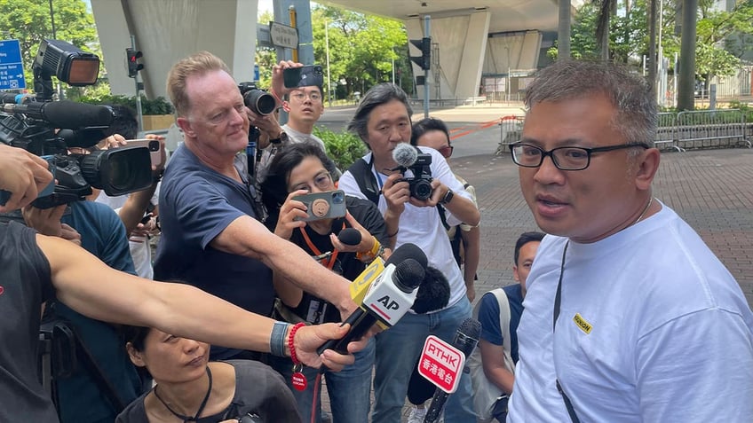 chairman of hong kong journalist association found guilty of obstructing police