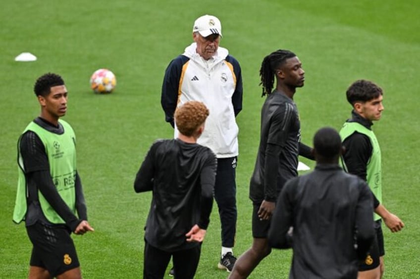 Real Madrid's Italian coach Carlo Ancelotti leads training at Wembley on the eve of the Ch