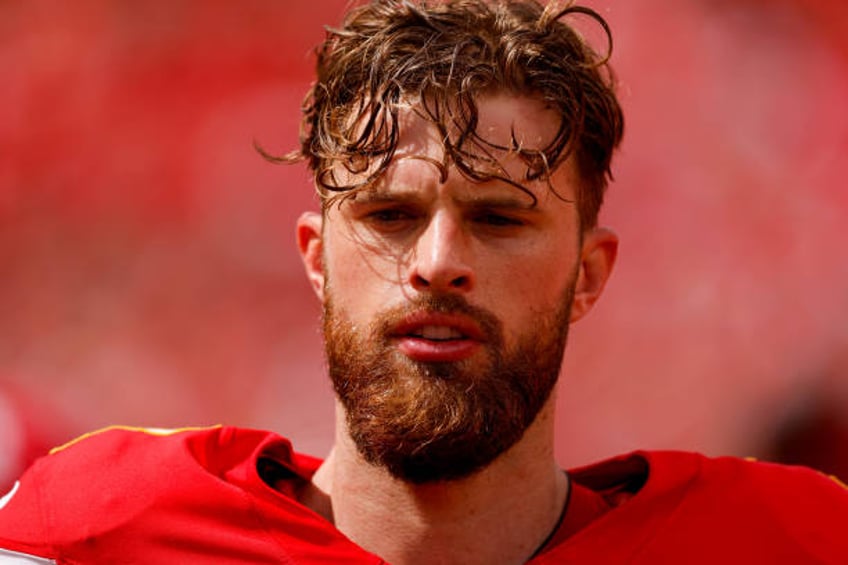 Harrison Butker of the Kansas City Chiefs walks the sidelines during the fourth quarter of a preseason game against the Cleveland Browns at GEHA...