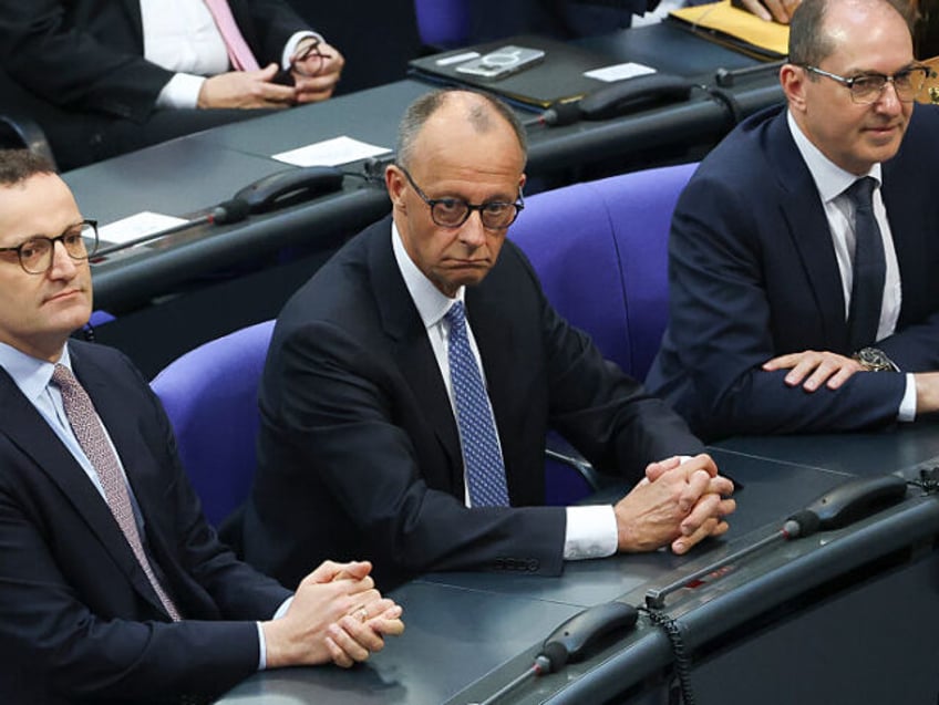 BERLIN, GERMANY - MAY 06: German Chancellor designate Friedrich Merz (C) of the German Chr