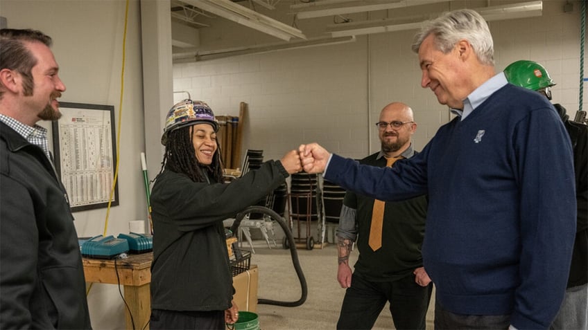 Sen-Whitehouse-Bumping-Fists