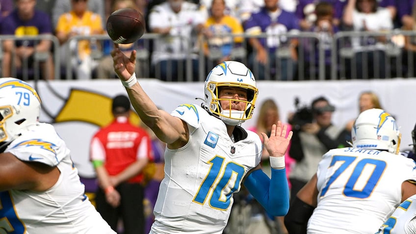 chargers hold off vikings on final drive to come away with first win of season