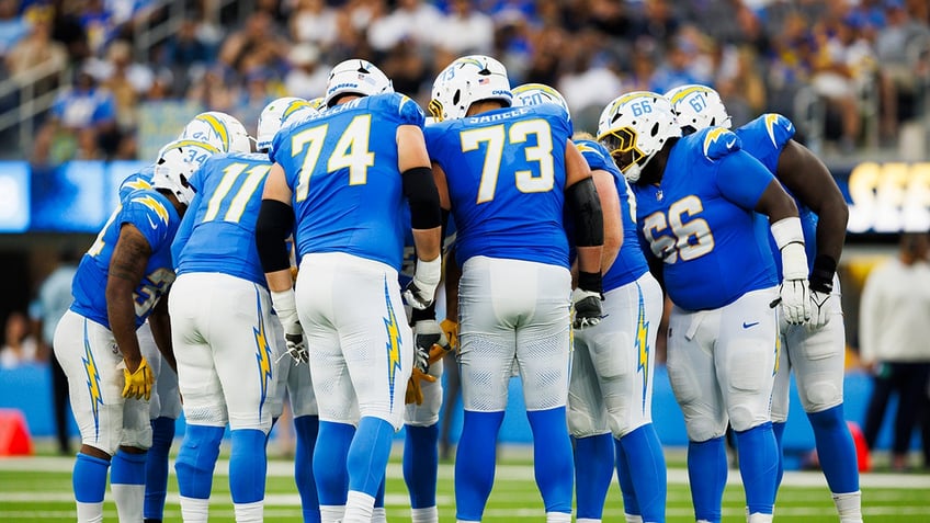 Chargers huddle