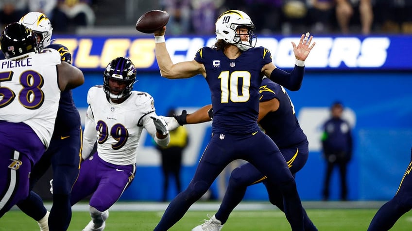 chargers turnover frenzy leads ravens to 9th win of season