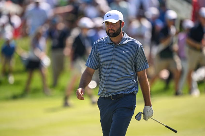 Scottie Scheffler of the United States walks the 18th fairway during the final round of the 2024 PGA Championship at Valhalla Golf Club on May 19,...