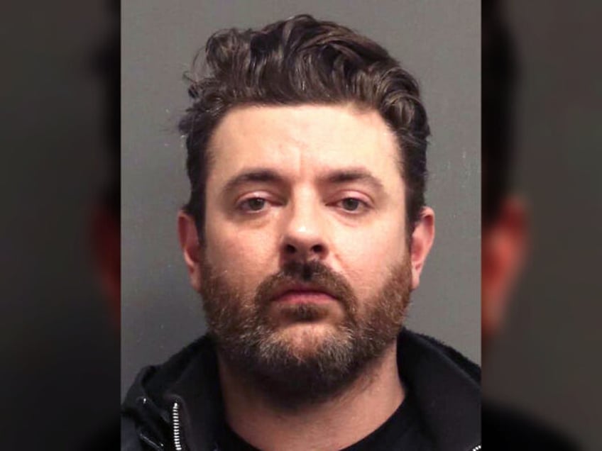 In this handout photo provided by the Metropolitan Nashville Police Department, singer Chris Young is seen in a police booking photo after being arrested for assaulting an officer, resisting arrest and disorderly conduct on January 22, 2024 in Nashville, Tennessee. (Photo by Metropolitan Nashville Police Department via Getty Images)