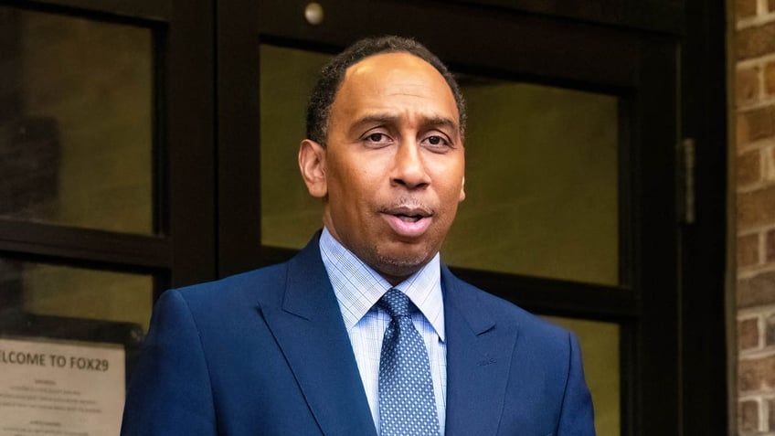 Stephen A. Smith walks